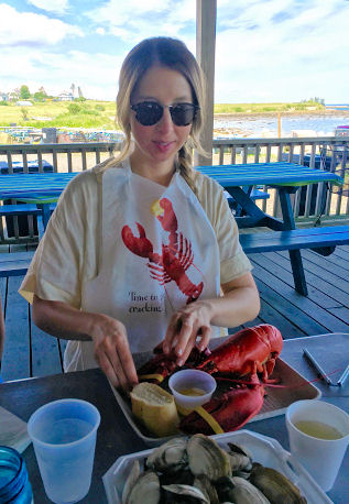 Anna contemplates lobster