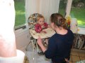 Rachel is on high chair duty