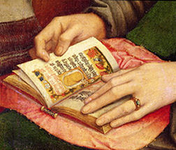 Hands and book