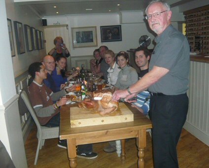 Peter carves the turkey