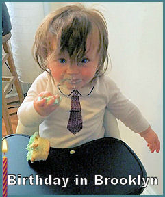 baby eating cupcake